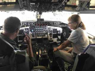 A 99 and an instructor in the KC-135 cockpit